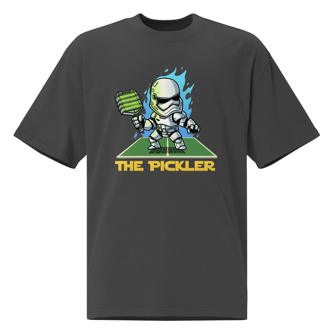 The Pickler faded pickleball T-shirt featuring a cartoon white-armored stormtrooper holding a green paddle with blue flames and court graphic