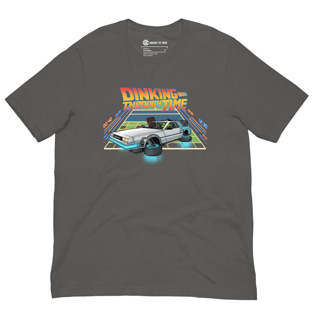 Dinking Through Time 80s-inspired pickleball T-shirt featuring a retro hover car racing across a neon pickleball court back to the future 