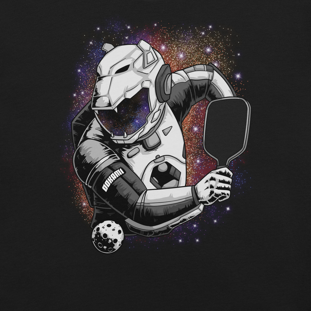 Cosmic Smash sci-fi pickleball graphic T-shirt featuring an armored cosmic creature holding a paddle against a colorful galaxy background