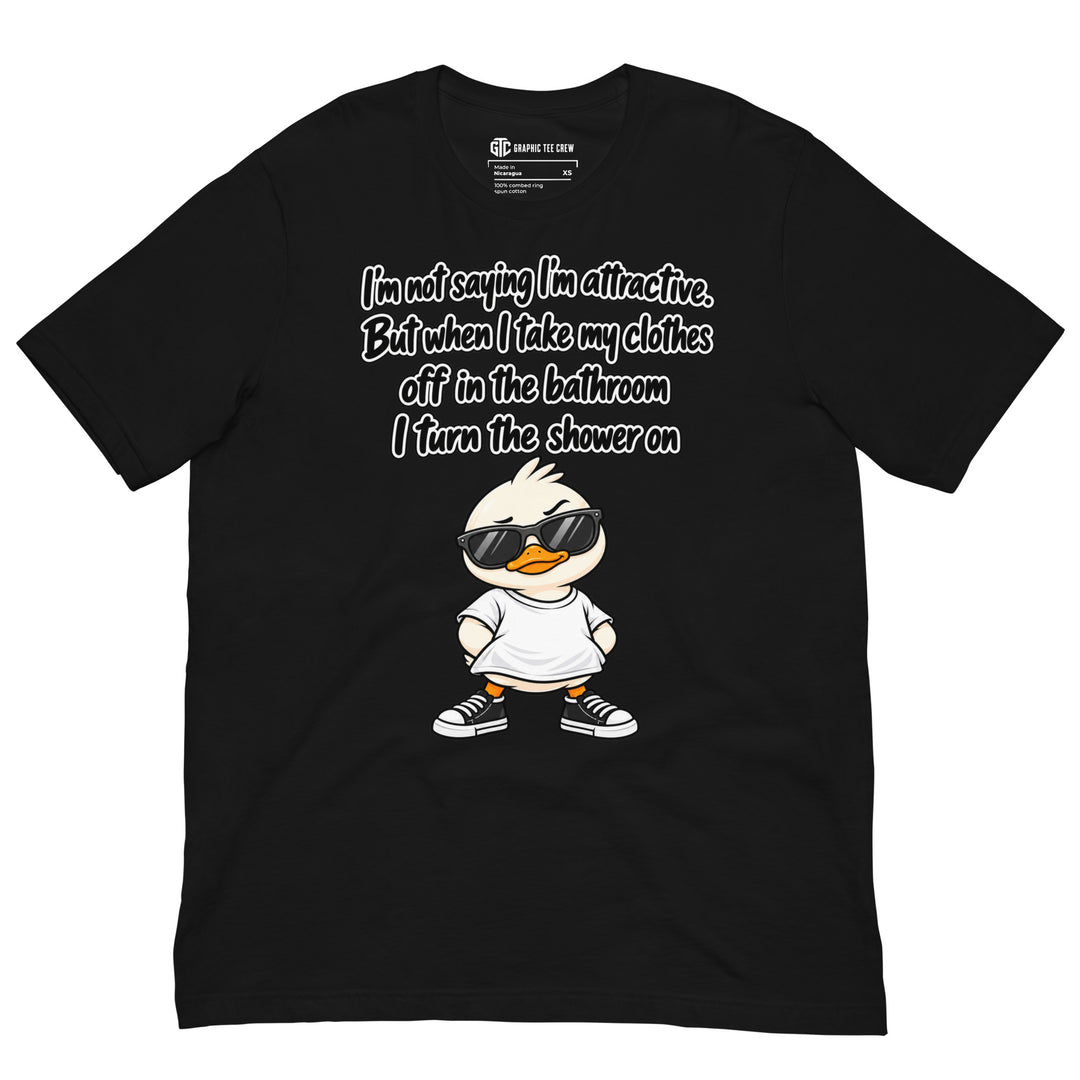 Black T-shirt featuring a cartoon duck in sunglasses beneath the “I’m Not Saying I’m Attractive” shower joke.