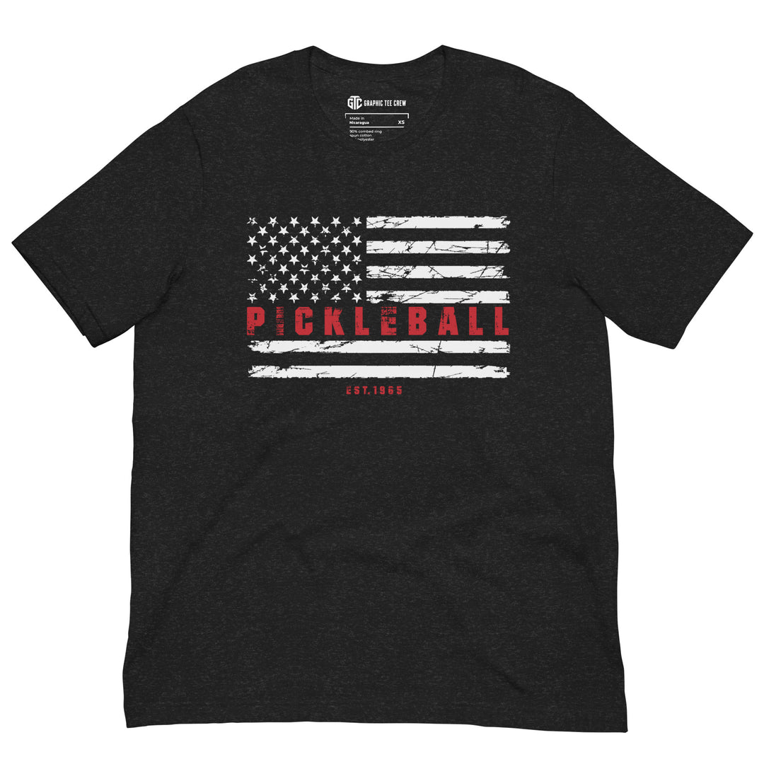 Black Heather Pickleball American flag T-shirt with distressed white stars and stripes, red Pickleball lettering and Est. 1965 detail
