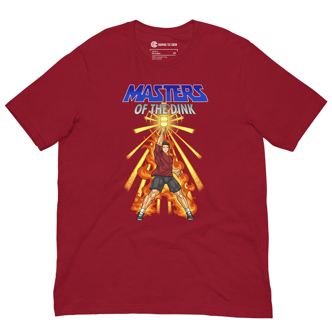 Masters of the Dink retro pickleball graphic T-shirt featuring a heroic player raising a glowing paddle above orange flames