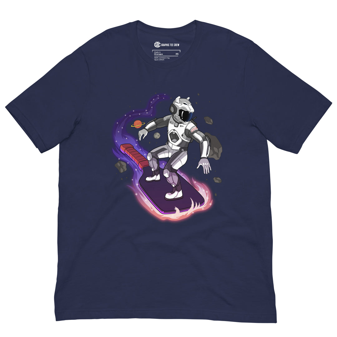 Cosmic Surfer pickleball graphic T-shirt featuring an armored space traveler riding a glowing paddle through planets and asteroids