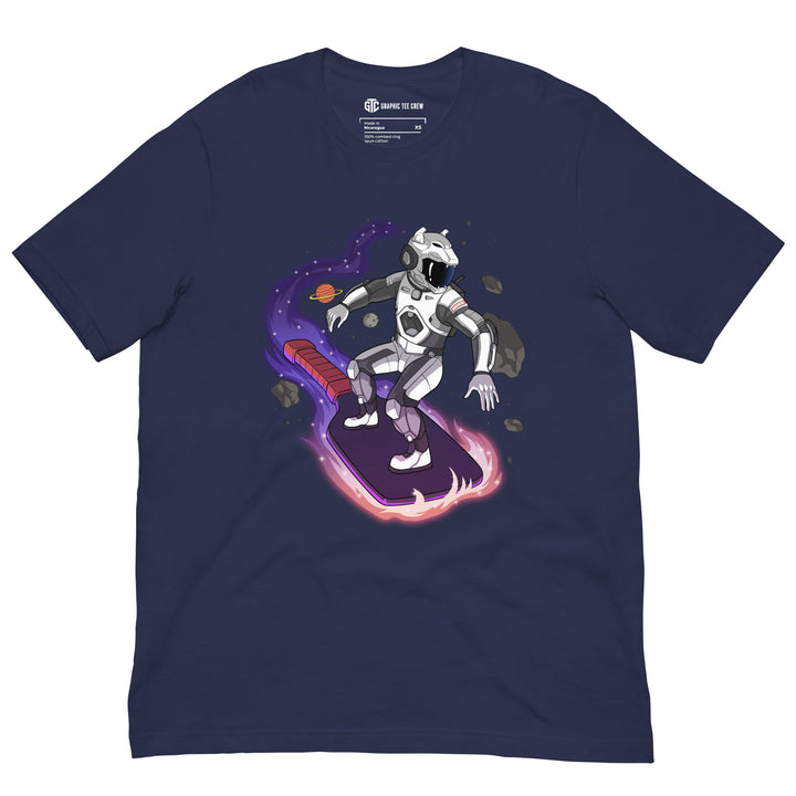 Cosmic Surfer pickleball graphic T-shirt featuring an armored space traveler riding a glowing paddle through planets and asteroids