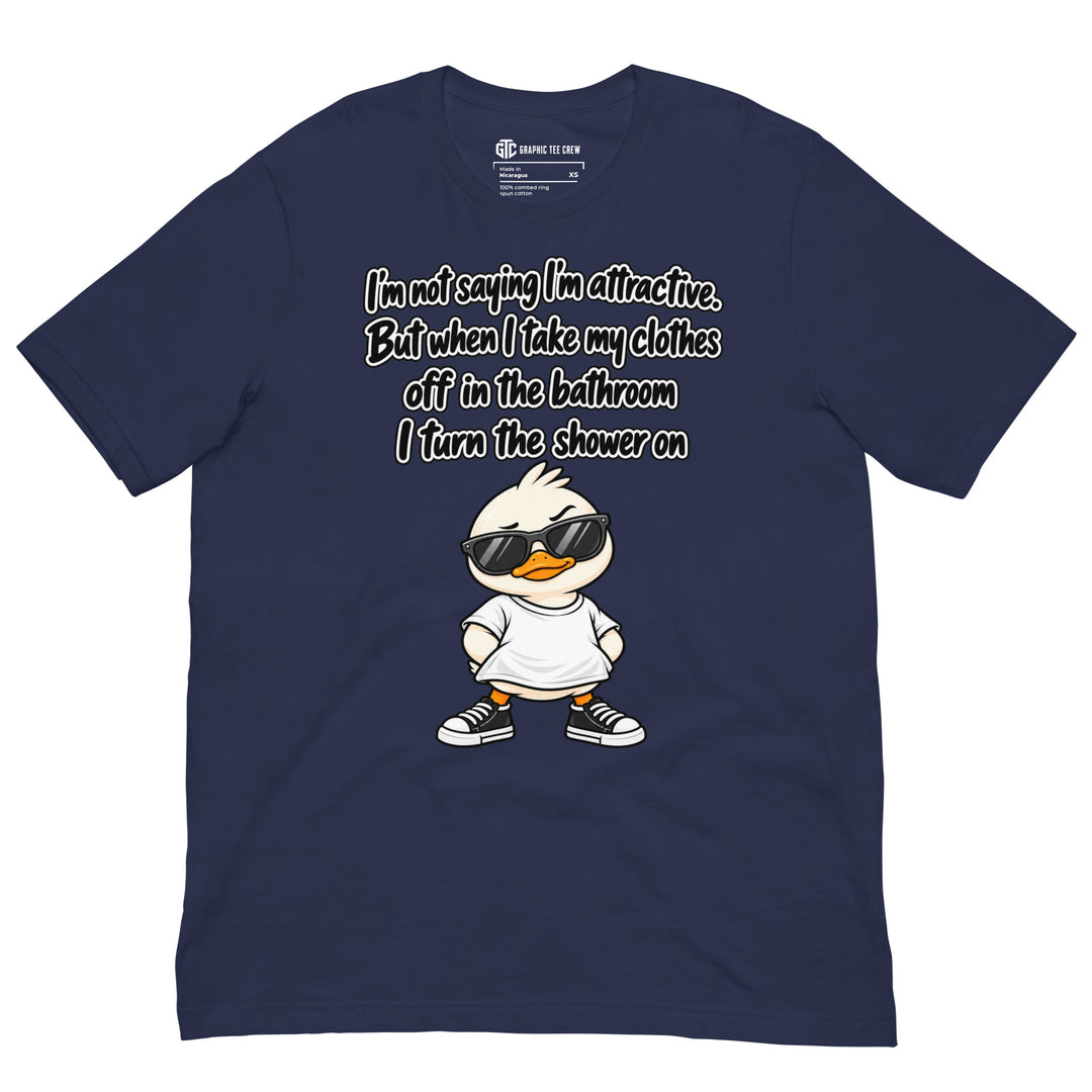 Navy T-shirt featuring a cartoon duck in sunglasses beneath the “I’m Not Saying I’m Attractive” shower joke.