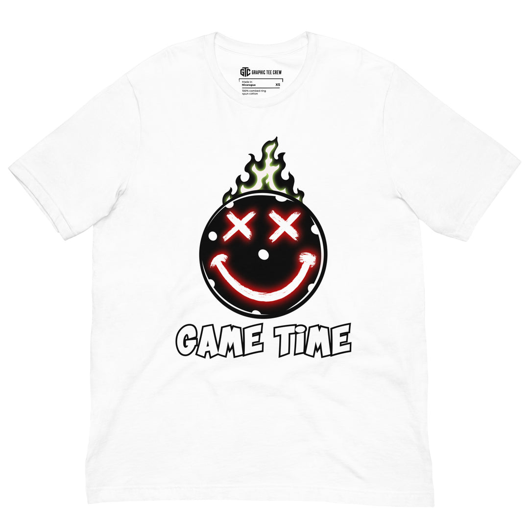Game Time flaming pickleball graphic T-shirt featuring glowing red X-shaped eyes, a smiling face and green flames